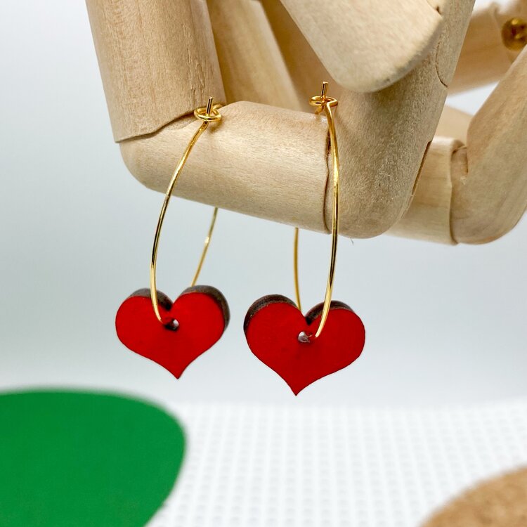 SHOCK OF GREY Wooden Heart in Red on Round Brass hoop